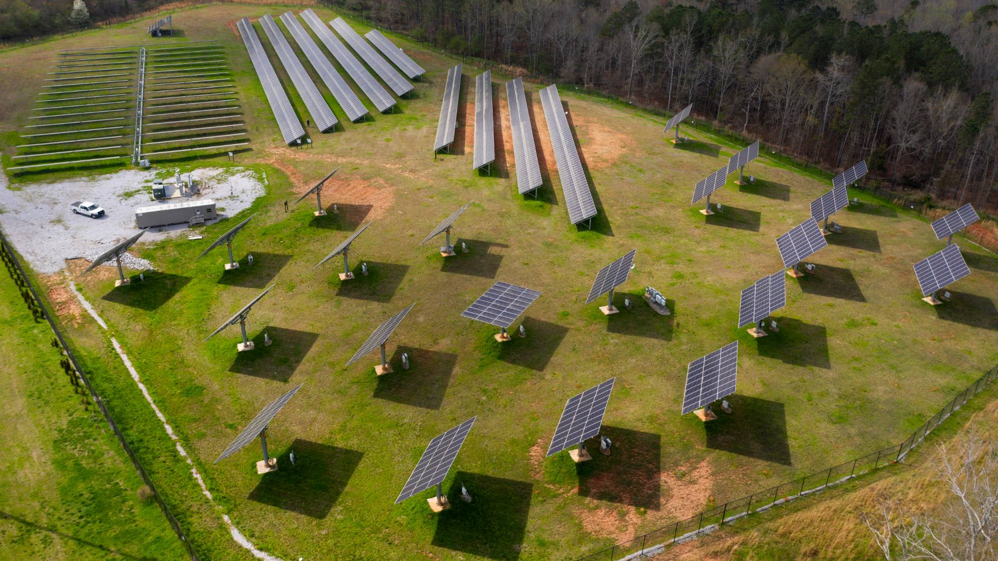 An aerial view of a field of solar panels